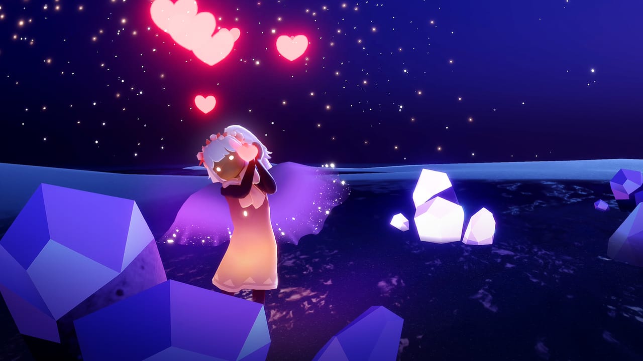 A Sky kid using their hands to make the shape of a heart in the water near crystals